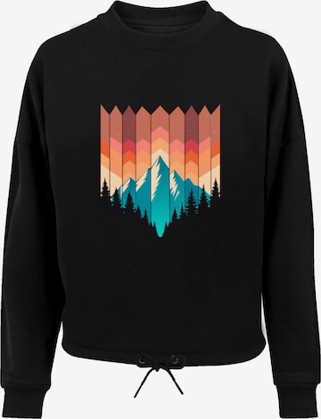Sweat-shirt 'Berg Sonnenuntergang Geometrisch' F4NT4STIC en noir : devant