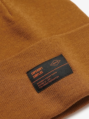 Bonnet 'SURPLUS' Superdry en beige