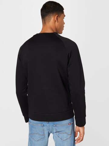 PUMA Tréning póló 'Classics Tech' - fekete