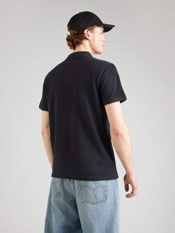 LEVI'S ® Poloshirt in Schwarz