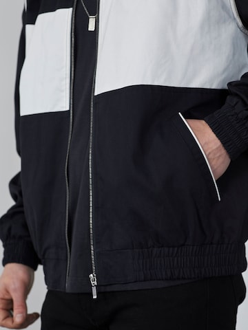 DAN FOX APPAREL Between-Season Jacket 'Jean' in Black