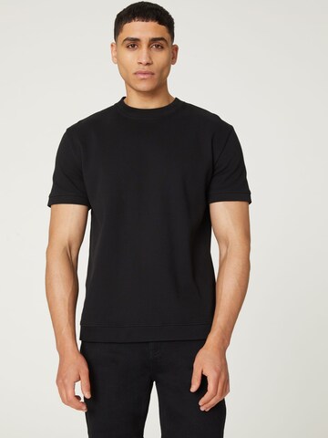 DAN FOX APPAREL - Camiseta 'Christos' en negro: frente