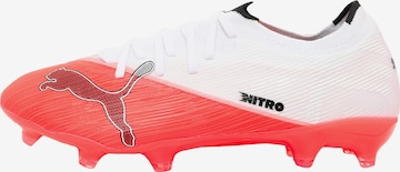 PUMA Jalkapallokengät 'ULTRA NITRO 7' värissä punainen: etupuoli