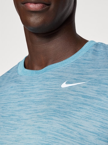 T-Shirt fonctionnel 'NEW VENEER' NIKE en bleu