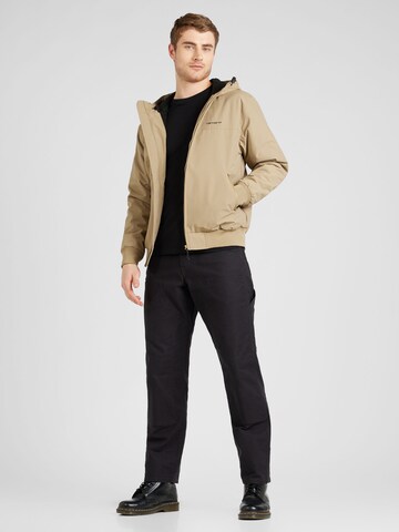 Carhartt WIPRegular Fit Prijelazna jakna - smeđa boja