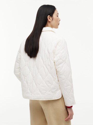 Veste mi-saison Tommy Jeans en blanc