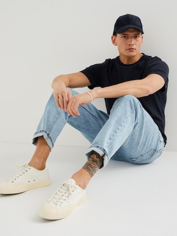 WE Fashion Tapered Jeans i blå