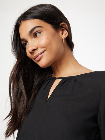 ABOUT YOU Blouse in Black