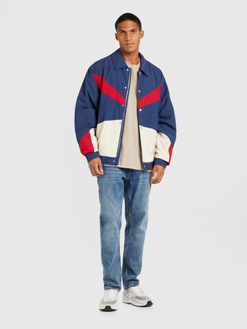 Veste mi-saison 'GAME DAY' Tommy Jeans en bleu