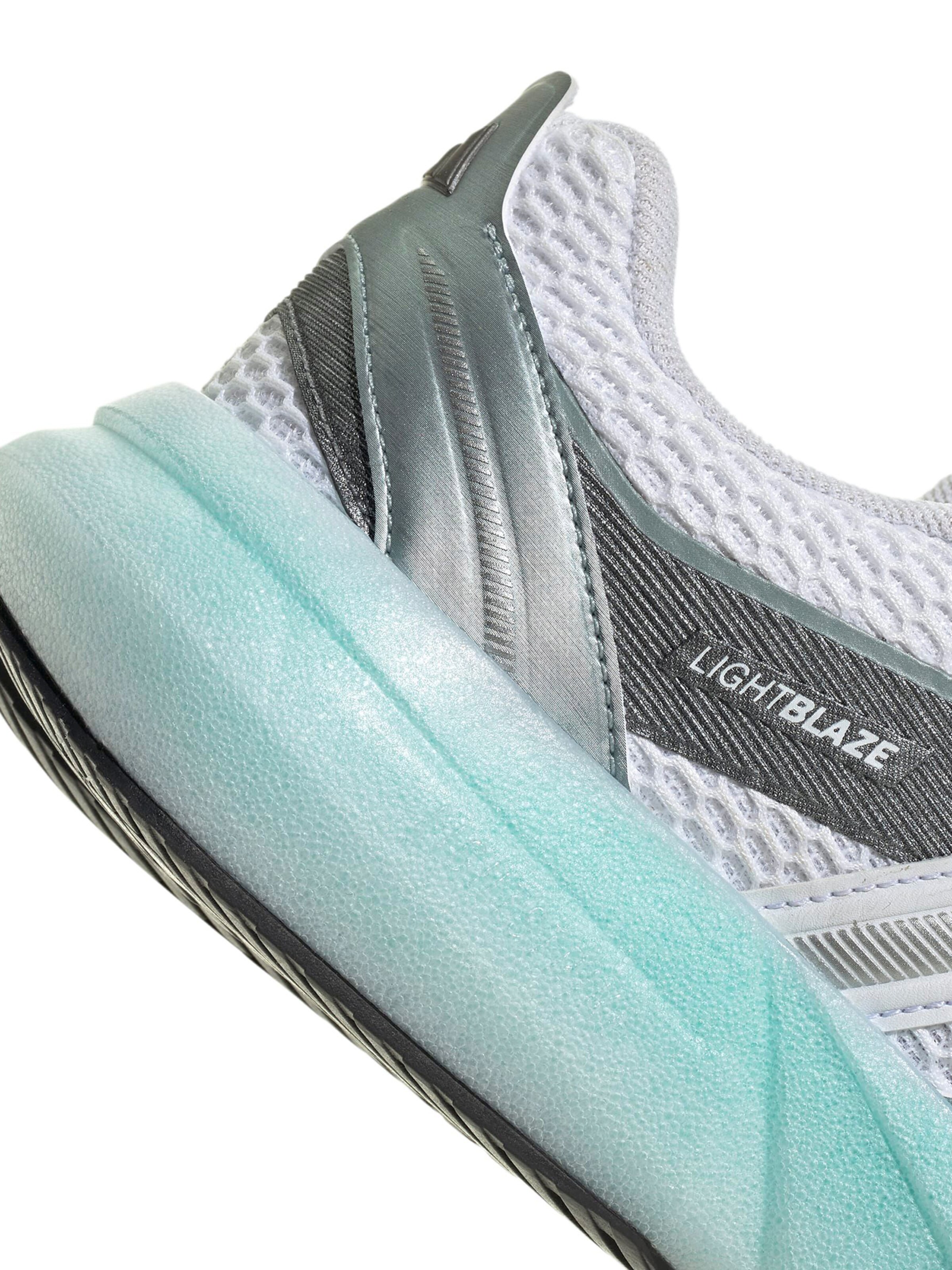 Baskets basses 'Lightblaze' ADIDAS SPORTSWEAR en blanc