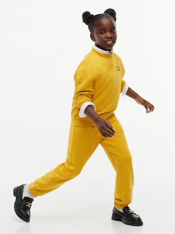 Effilé Pantalon TOMMY HILFIGER en jaune