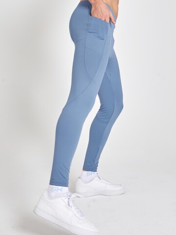 Coupe slim Pantalon de sport 'Long Running Tights' SPORTKIND en gris