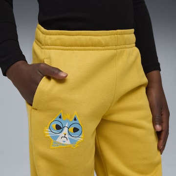 PUMA Tapered Trousers 'Moody Cat' in Yellow