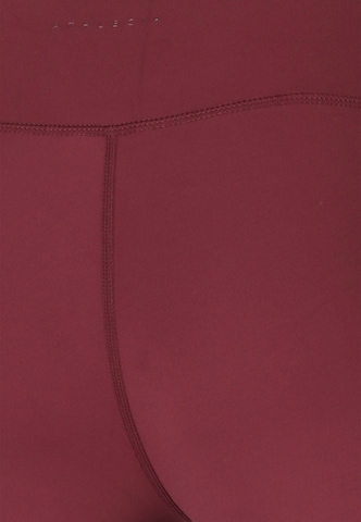 Athlecia Skinny Workout Pants 'Blossom' in Red