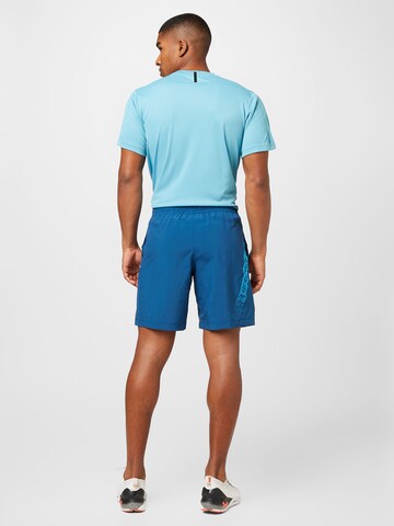 Regular Pantalon de sport UNDER ARMOUR en bleu