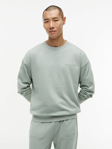 TOMMY HILFIGER Sweatshirt 'Essential' in Groen: voorkant
