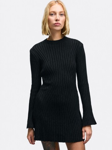 Robes en maille 'Strickkleider' Ethiquet en noir