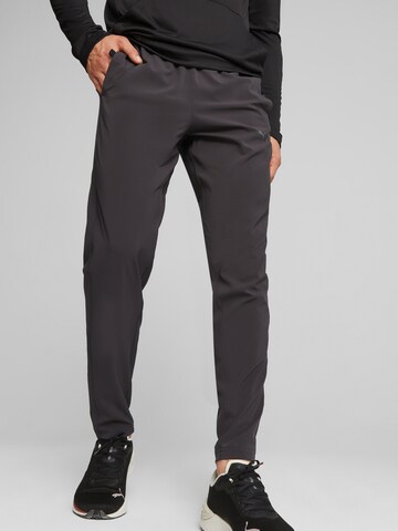 PUMA - Tapered Calças de desporto em preto: frente