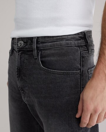 WE Fashion Regular Jeans in Zwart