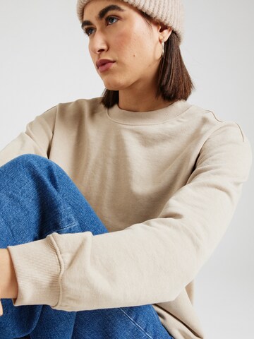 Monki Sweatshirt in Beige