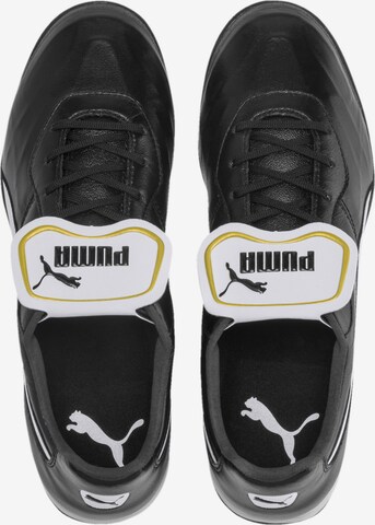 Scarpa da calcio 'King' di PUMA in nero