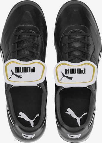 Chaussure de foot 'King' PUMA en noir