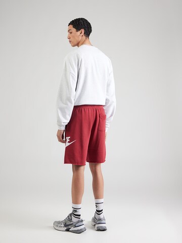 Nike Sportswear Avar lõige Püksid 'CLUB ALUMNI', värv punane