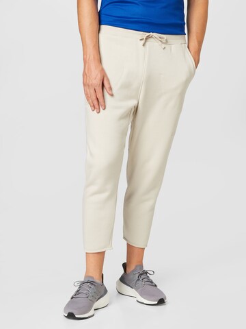 Loosefit Pantalon de sport 'Studio Lounge Fleece' ADIDAS SPORTSWEAR en beige : devant