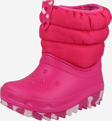 Bottes de neige Crocs en rose : devant