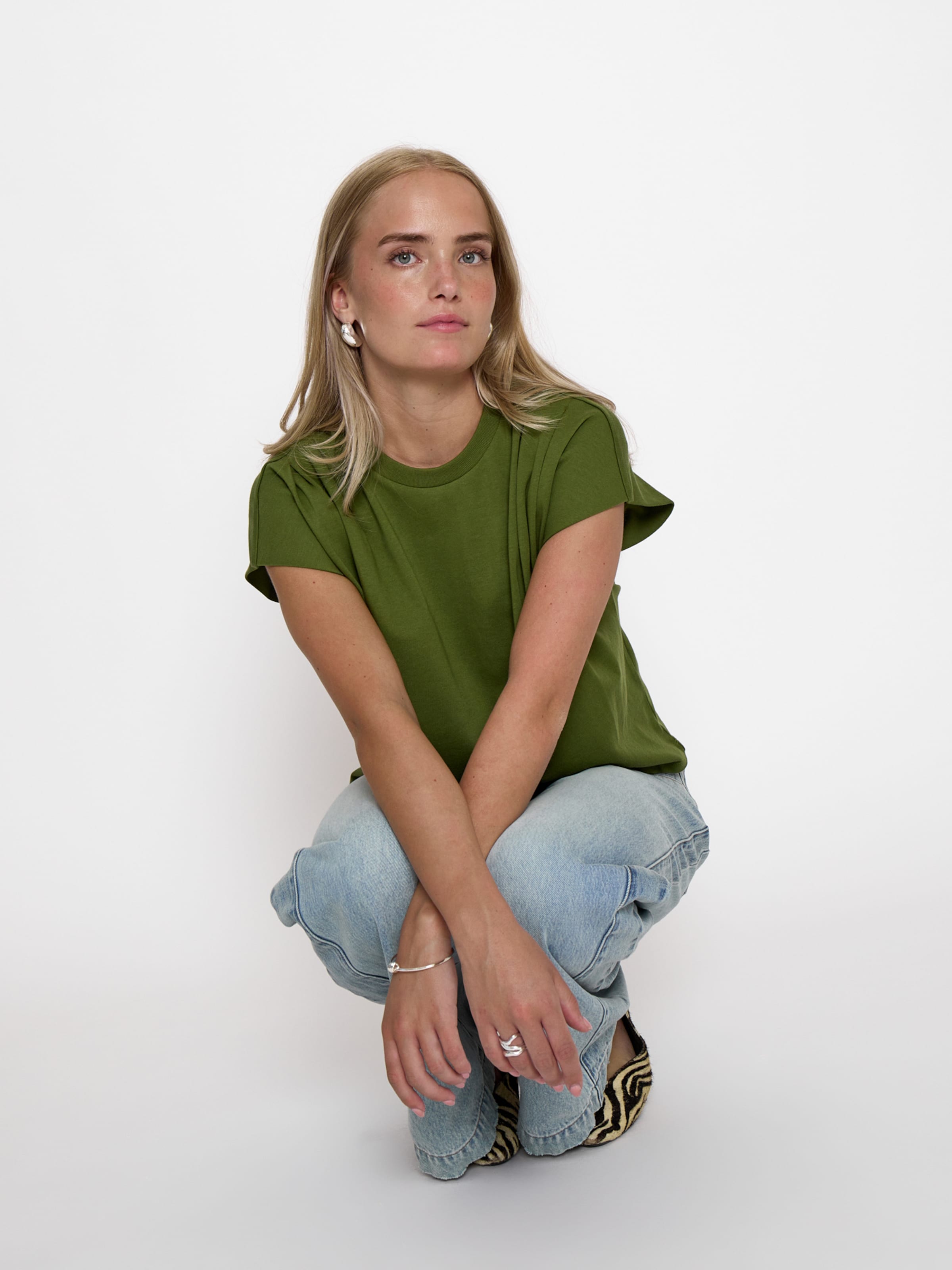 Top di minus in verde