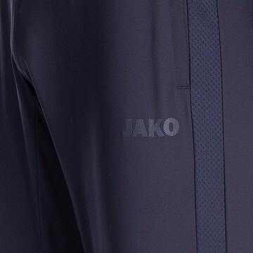 Coupe slim Pantalon de sport JAKO en bleu