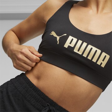 PUMA Bustier Sport bh in Zwart