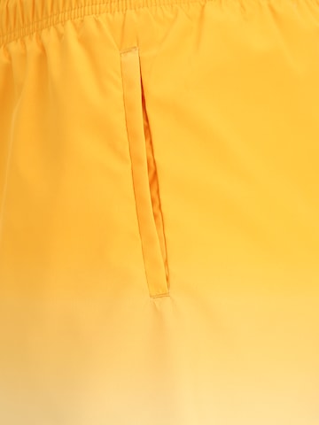 Tommy Jeans Kratke kopalne hlače | rumena barva