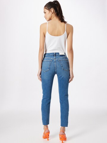 Skinny Jeans '90S' di RE/DONE in blu