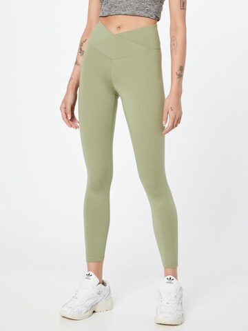 Casall Skinny Workout Pants 'Overlap' in Green: front