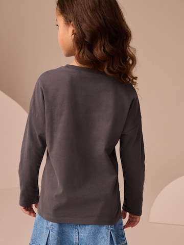 T-Shirt Next en gris