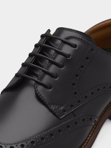 Chaussure à lacets 'CraftRemi' CLARKS en noir