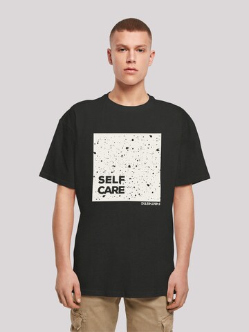 F4NT4STIC T-Shirt 'SELF CARE' in Schwarz: predná strana
