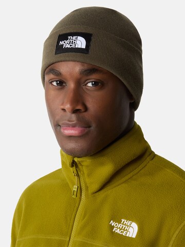 Căciulă de la THE NORTH FACE pe verde