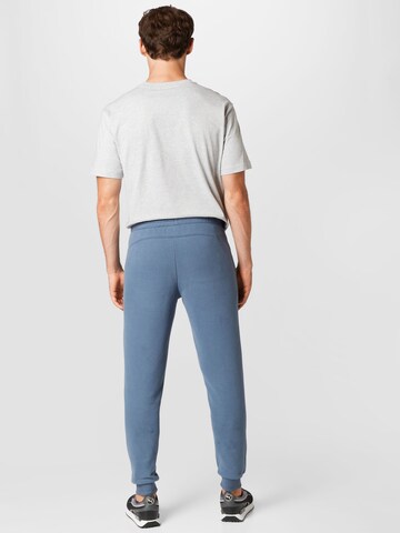 PUMA - Tapered Pantalón deportivo en azul