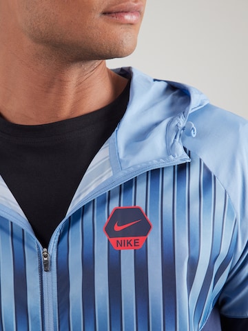 Nike Sportswear Přechodná bunda – modrá