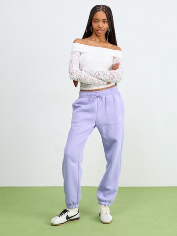 Nike Sportswear Конический (Tapered) Штаны 'PHNX FLC' в Лиловый