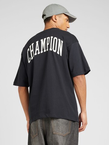 Champion Authentic Athletic Apparel - Camisa em preto: frente