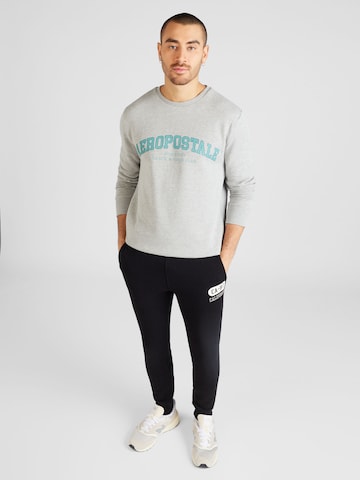 Sweat-shirt 'TRACK & FIELD' AÉROPOSTALE en gris