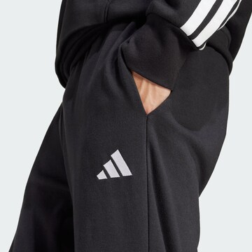 ADIDAS SPORTSWEAR Tapered Sports trousers 'FEELCOZY' in Black