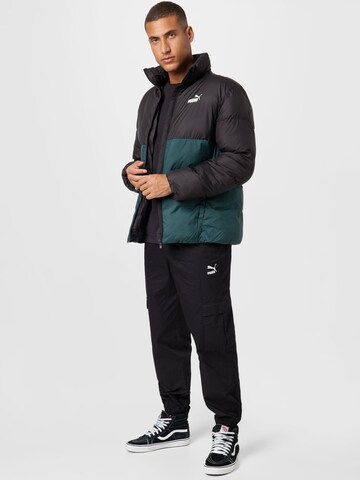PUMA Tapered Cargo trousers in Black