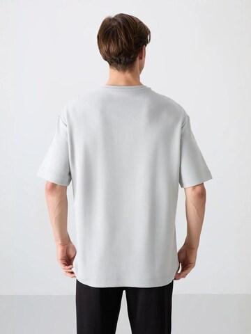 T-Shirt 'T-Shirts' Tommy Life en gris
