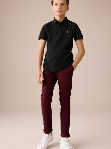 Next Slimfit Housut värissä punainen