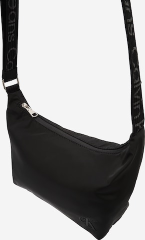 Sac bandoulière Calvin Klein Jeans en noir