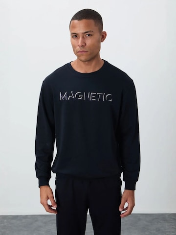 Sweat-shirt Tommy Life en noir : devant